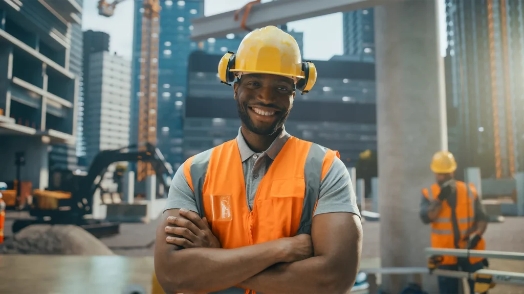Smiling contractor at a construction site